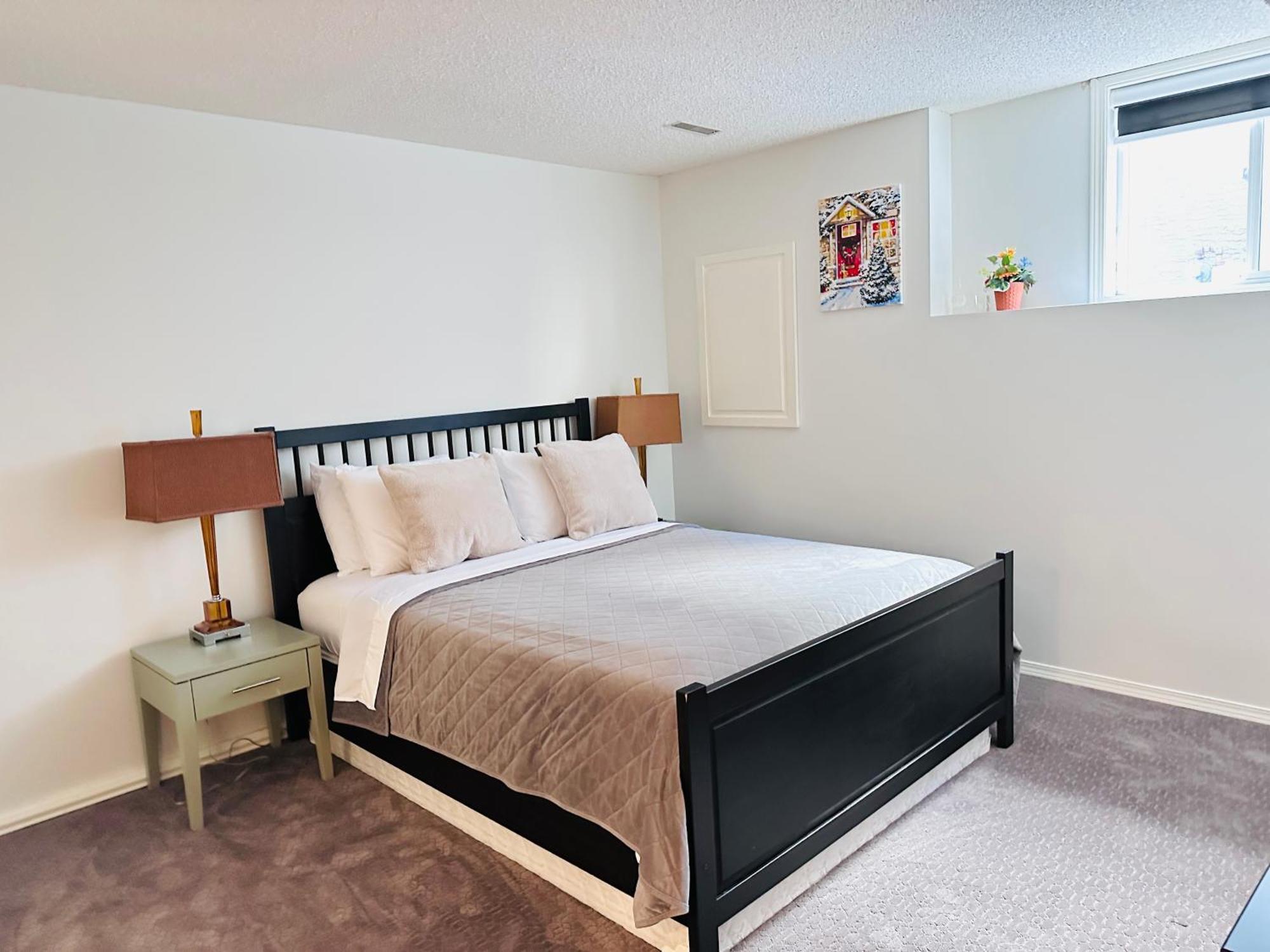 2 Bedrooms Private Basement Close To Winsport & Downtown *