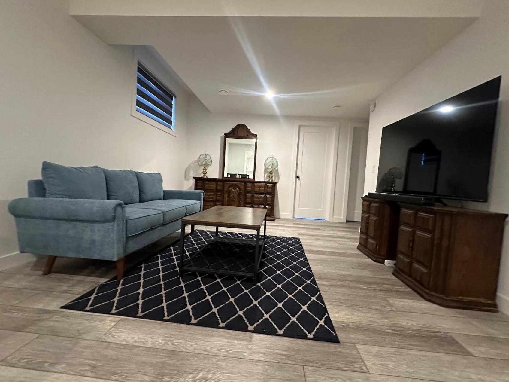 Spacious 2 Bedroom & Kitchen Basement Near Airport Apartment