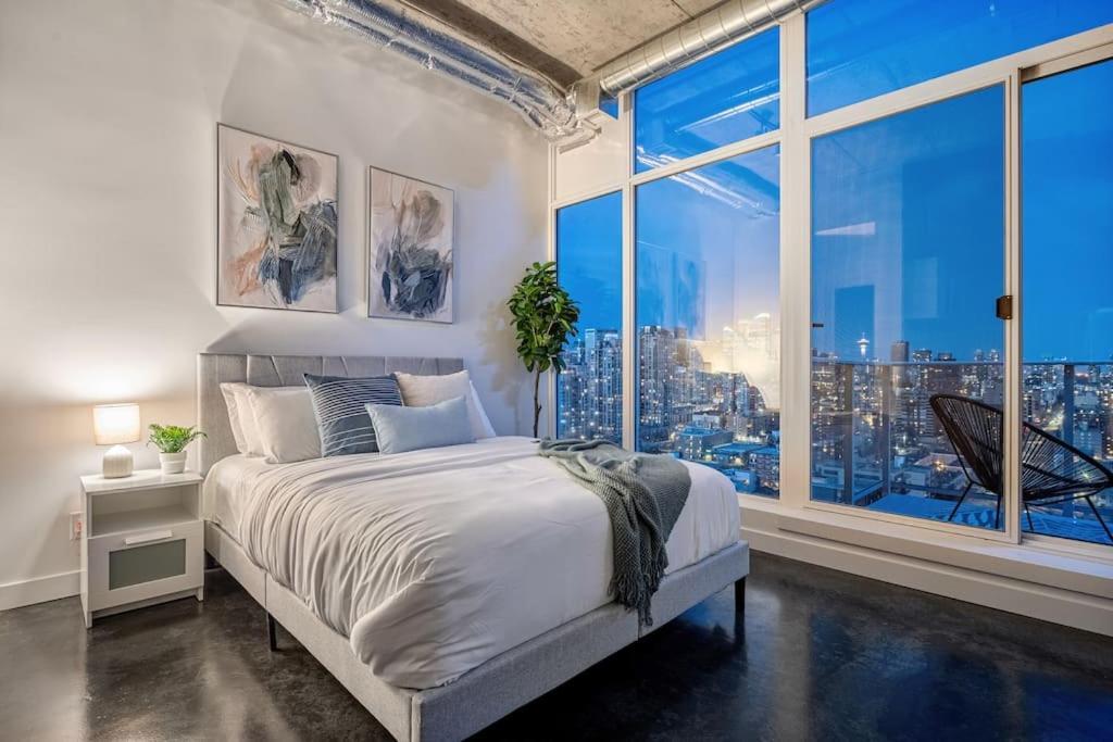 Just Steps From Stampede Park, Luxury Living Apartment *