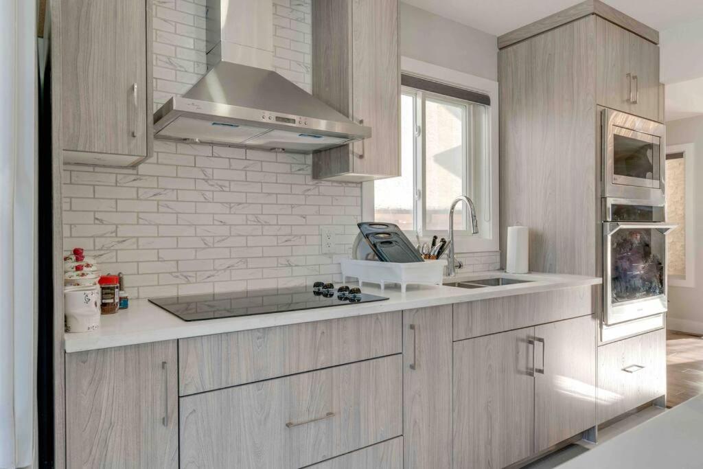 Rare Find Fully Renovated 6 Bedroom 3 Bath And Both Levels Chalet Calgary